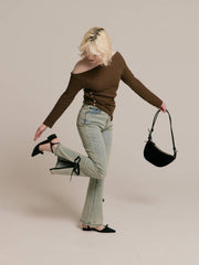 Asymmetrical gold button tops