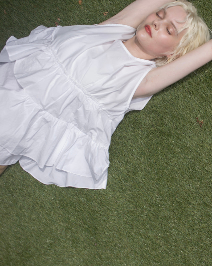 【残りわずか】Ruffled peplum blouse