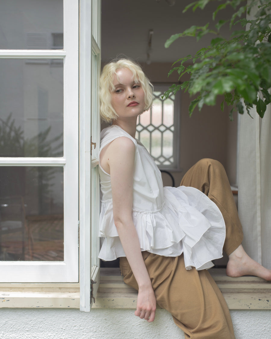 【残りわずか】Ruffled peplum blouse