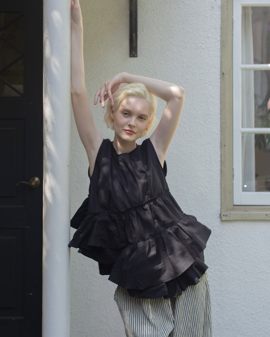 【残りわずか】Ruffled peplum blouse