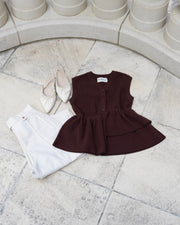 Asymmetric peplum vest