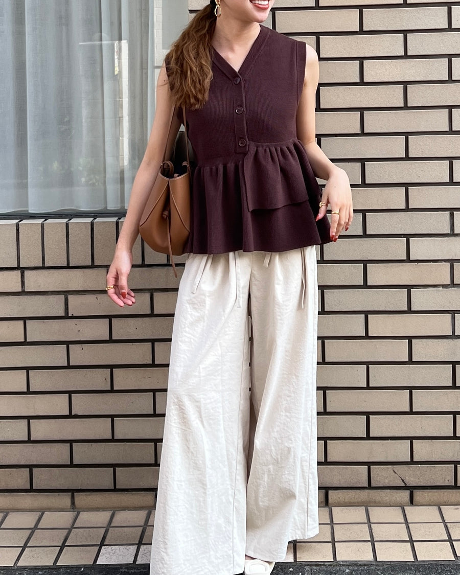 Asymmetric peplum vest