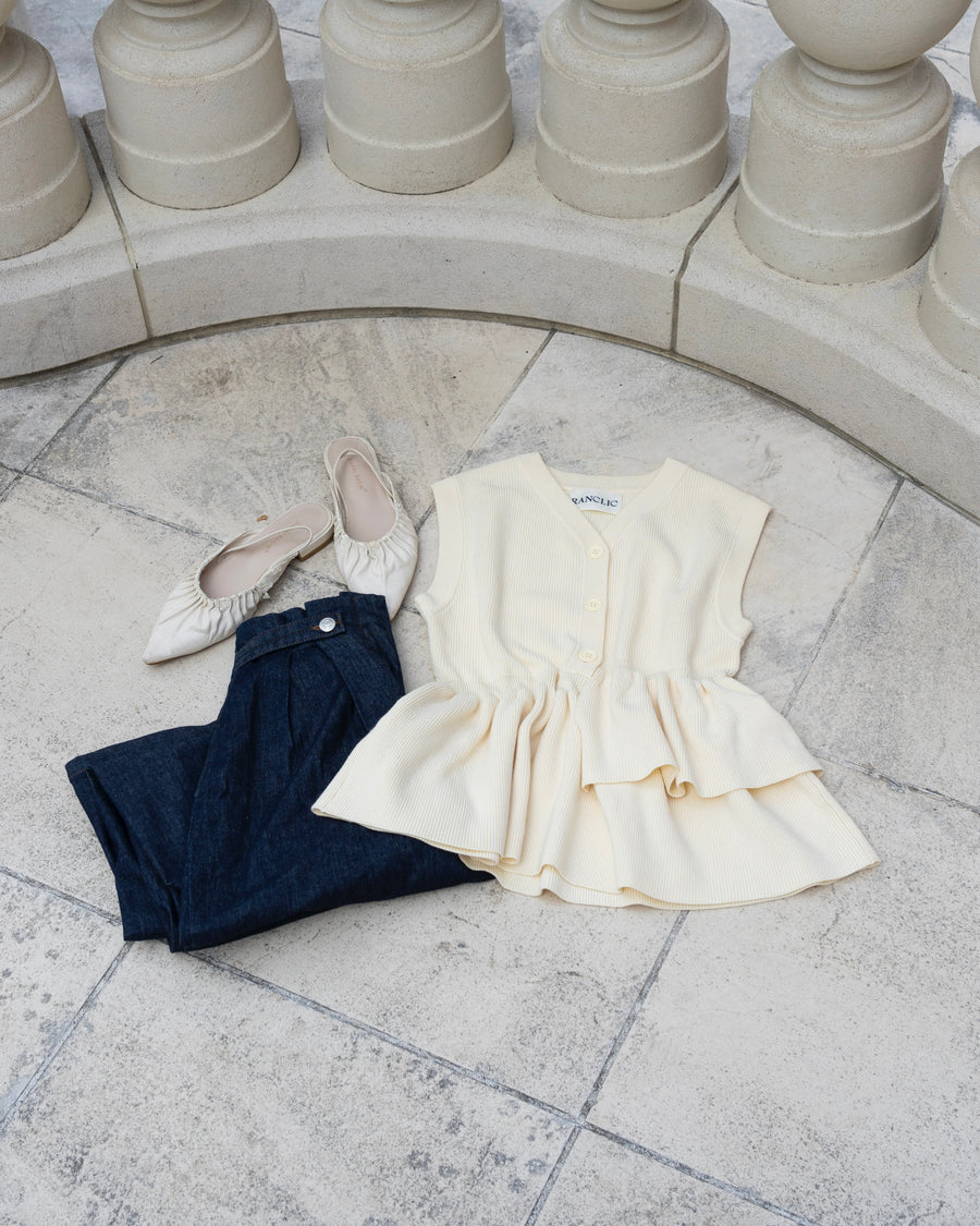 Asymmetric peplum vest