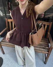 Asymmetric peplum vest