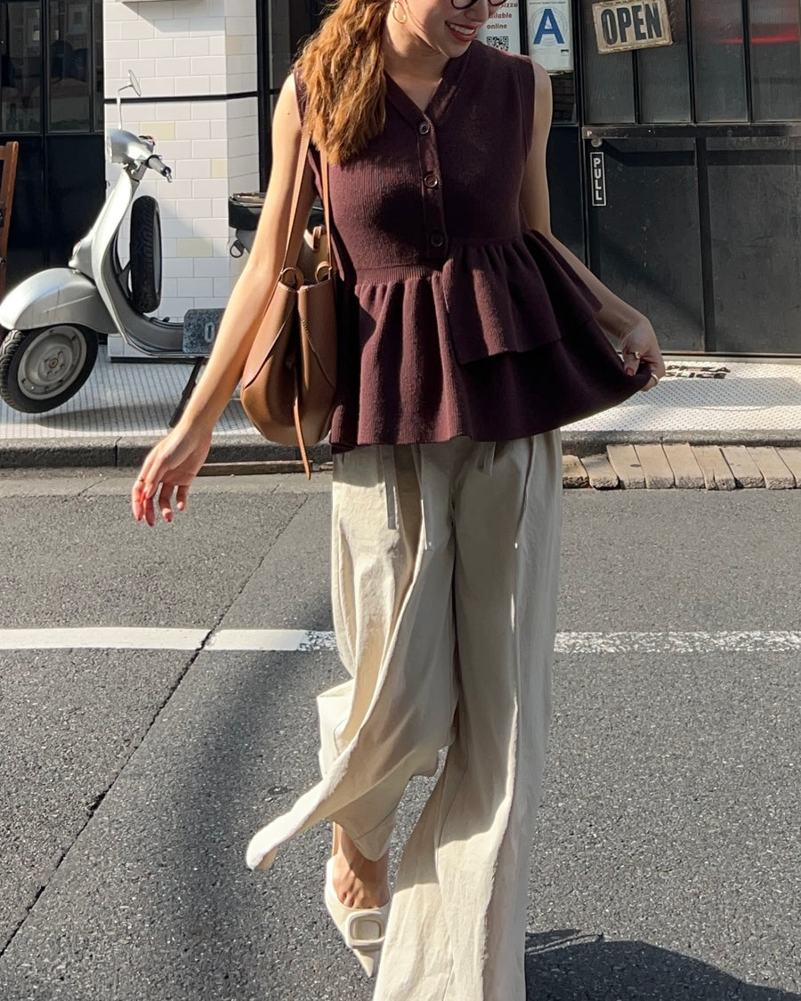 Asymmetric peplum vest