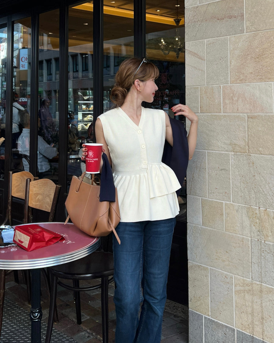 Asymmetric peplum vest