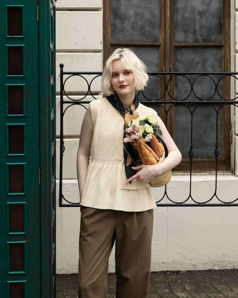 Asymmetric peplum vest