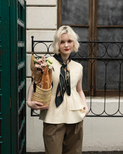 Asymmetric peplum vest