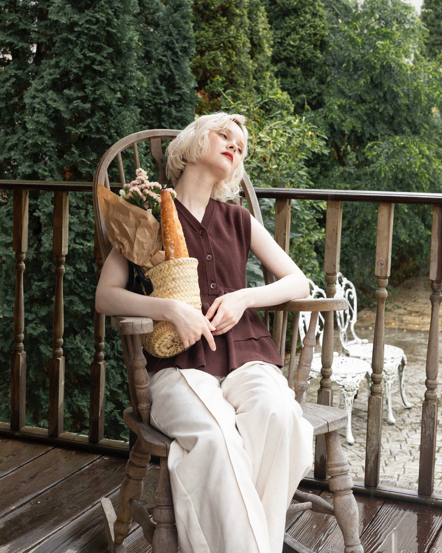 Asymmetric peplum vest