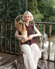 Asymmetric peplum vest