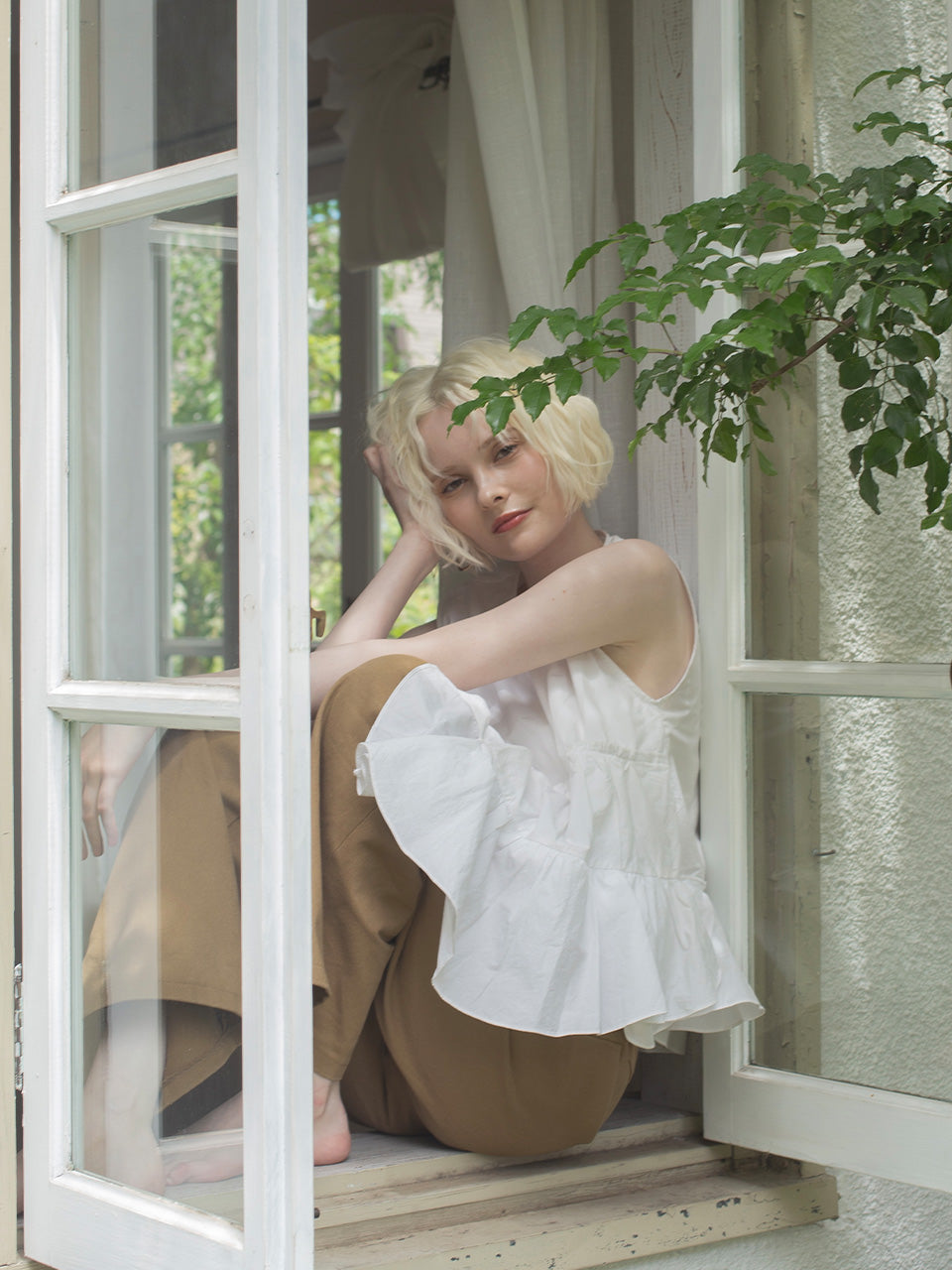【残りわずか】Ruffled peplum blouse